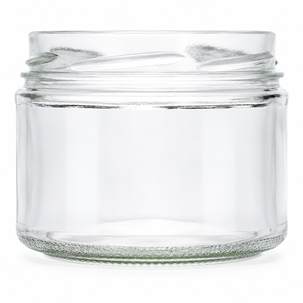 Klares Konservenglas 540 ml mit breiter TO-100-Mündung, niedriger Rundform und strukturiertem Glasboden auf weißem Hintergrund.