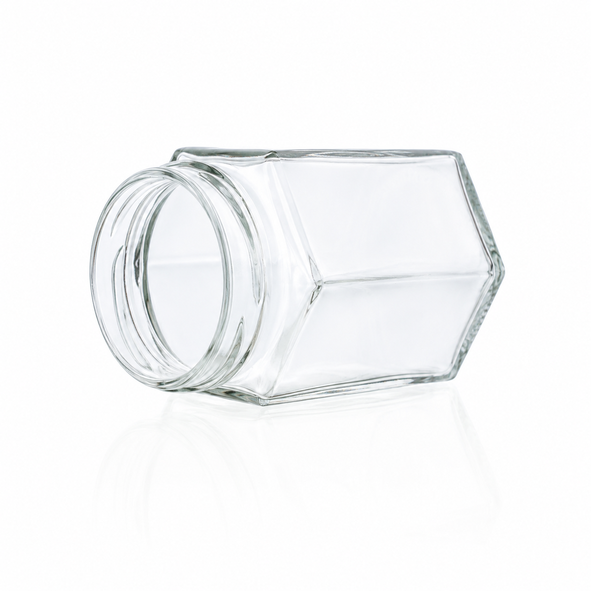 Sechskantglas 195 ml TO 58 aus klarem Glas mit sechs geraden Seitenflächen und Twist-off-Mündung, seitlich liegend dargestellt.
